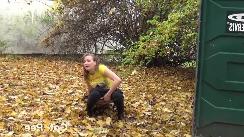 15P Pretty teen pisses in the middle of a public park