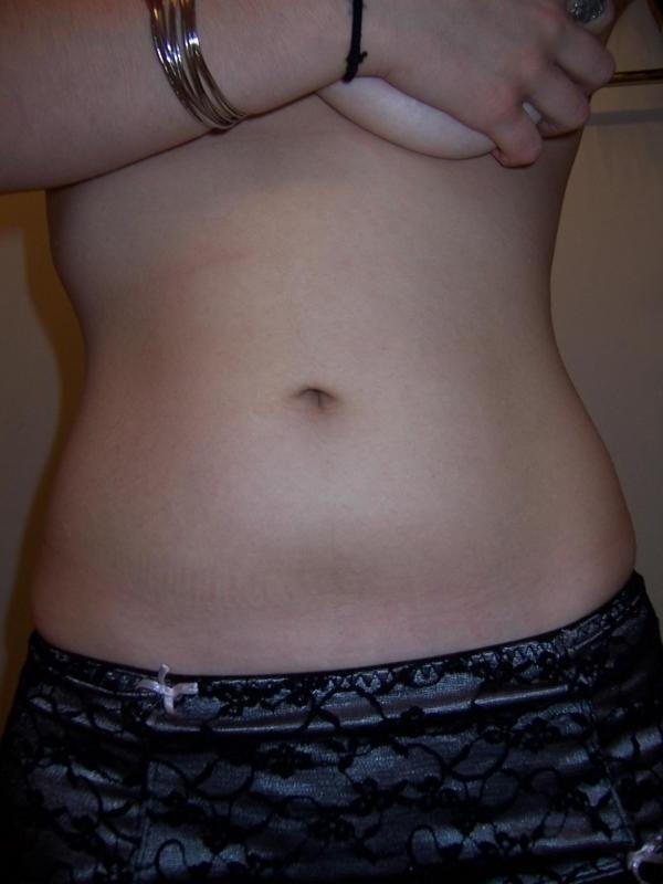 14P Amateur redhead hottie with pierced nipples gets naked