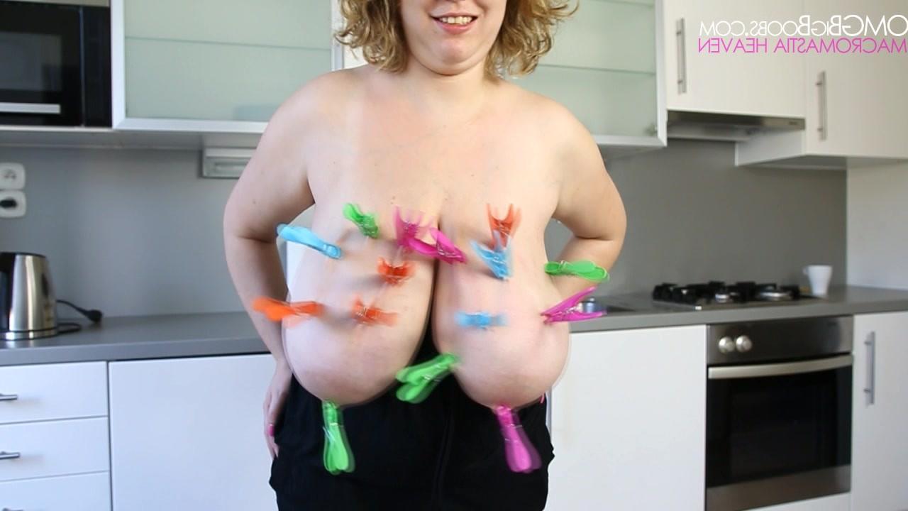 15P Amateur places clothes pins all over her gigantic tits