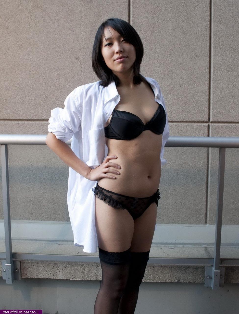 10P Young Asian is showing off her beautiful body outdoors