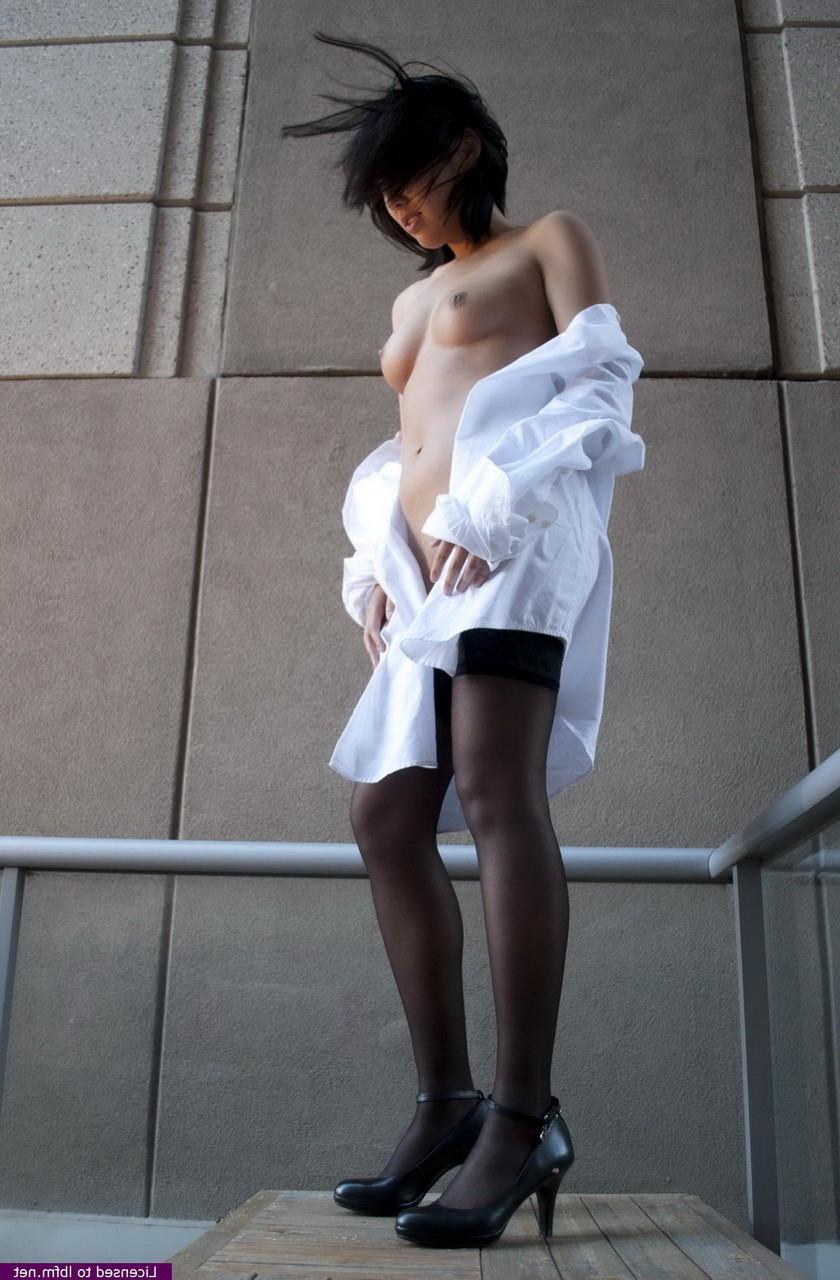 10P Young Asian is showing off her beautiful body outdoors