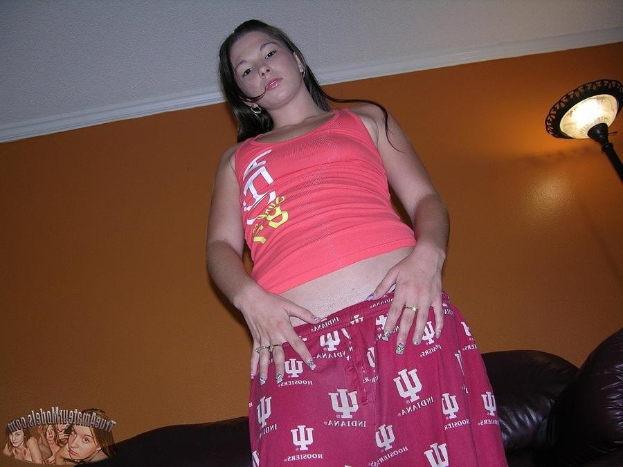 14P Ava removes clothing to expose dirty teenage butthole