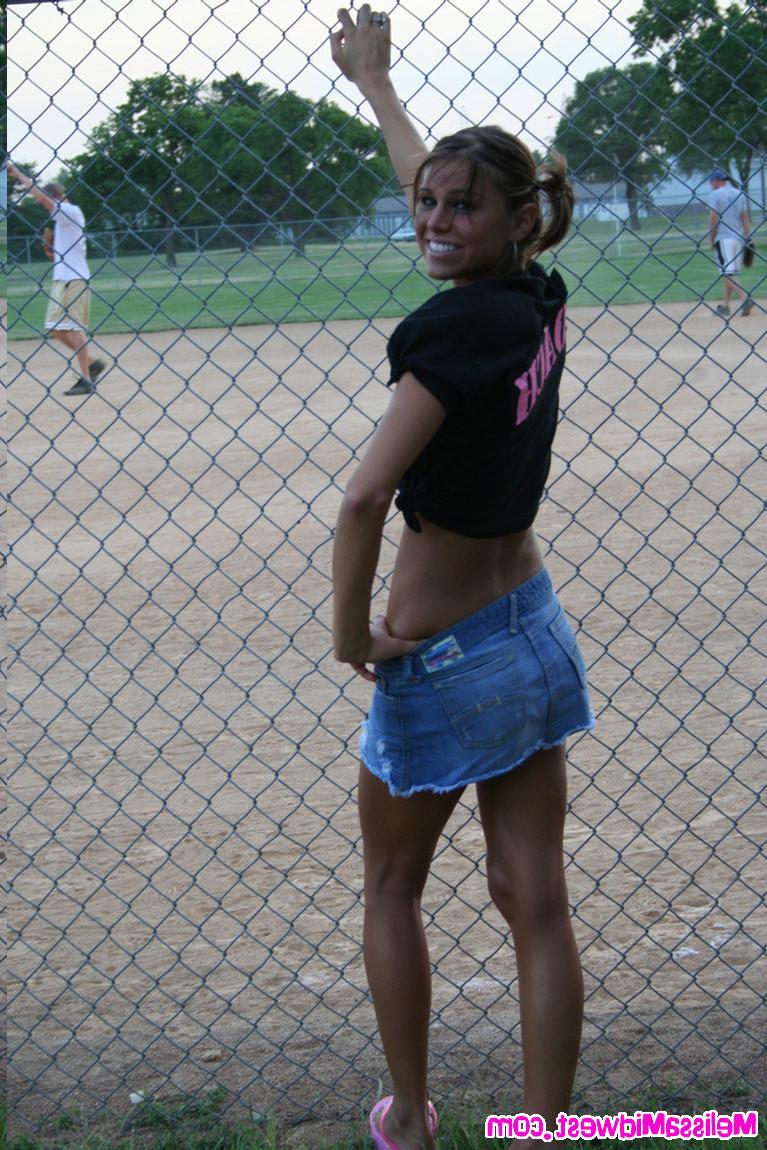 15P Melissa Midwest out at a softball game with her team shirt on