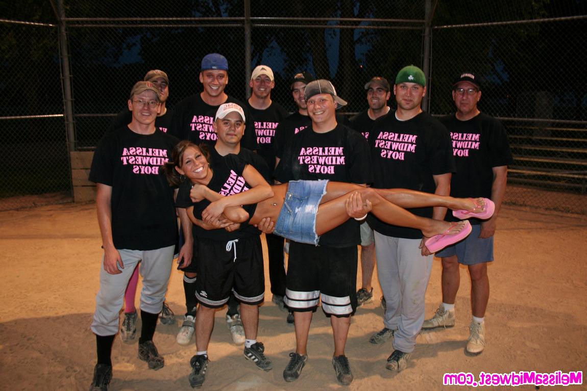 15P Melissa Midwest out at a softball game with her team shirt on