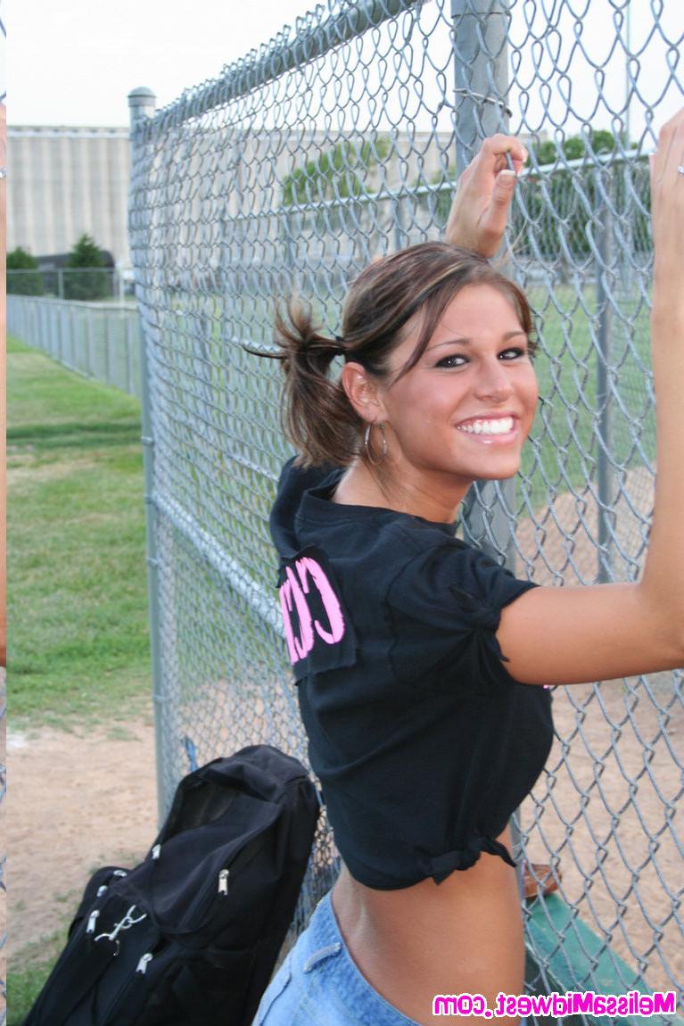 15P Melissa Midwest out at a softball game with her team shirt on