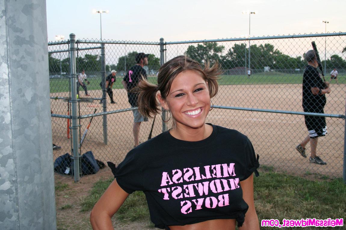 15P Melissa Midwest out at a softball game with her team shirt on