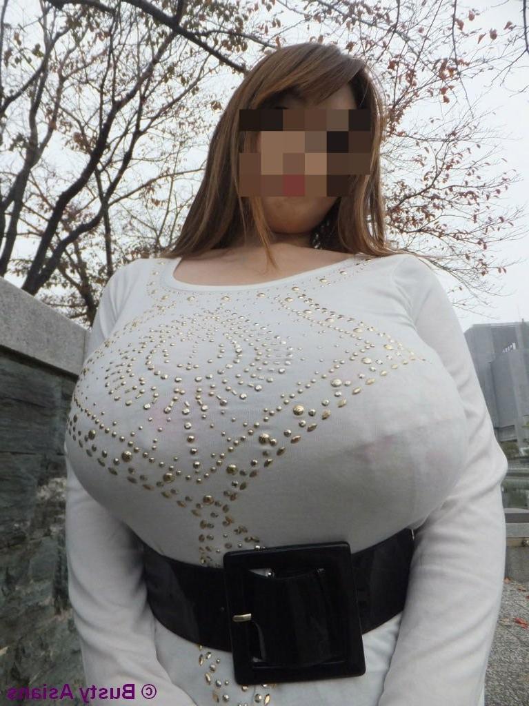 16P Amateur busty asian with monster big tits posing in public