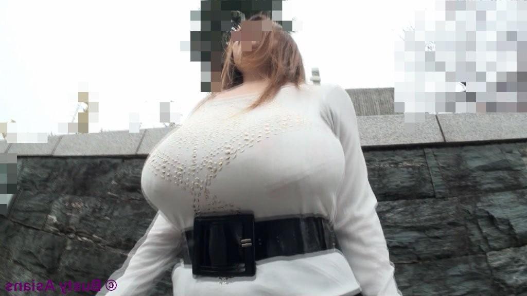 16P Amateur busty asian with monster big tits posing in public