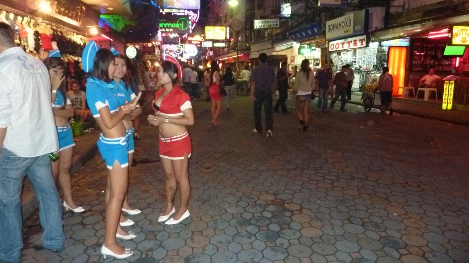 25P Hot Thai Teen street hooker flashing her tender asian pussy