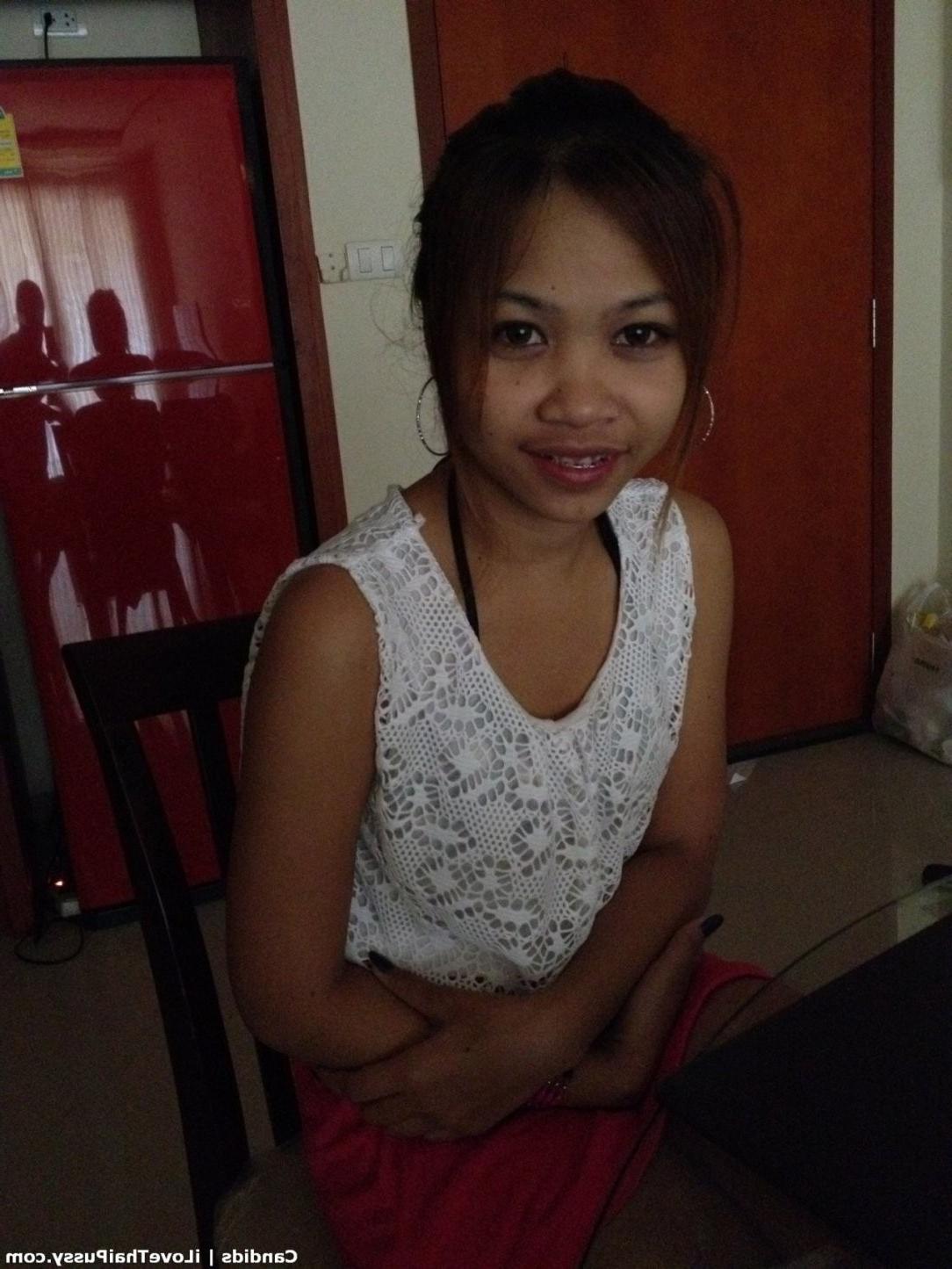 25P Hot Thai Teen street hooker flashing her tender asian pussy