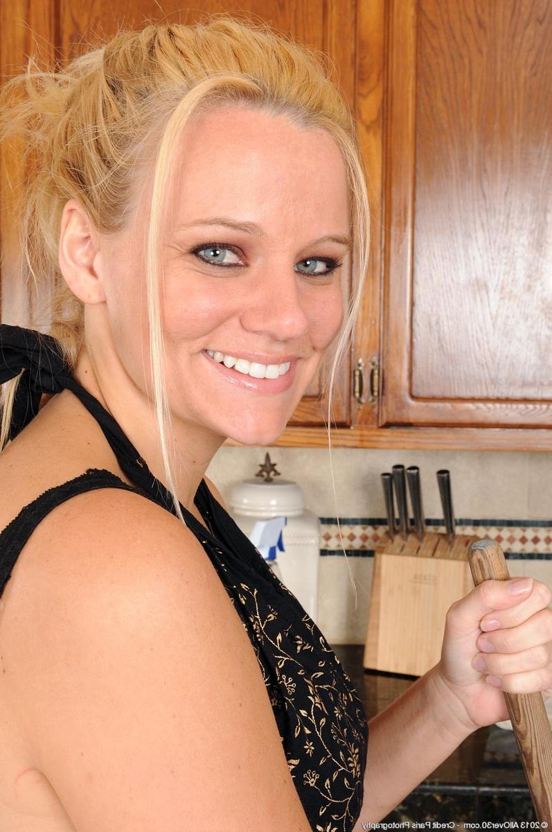 15P Horny natural housewife in the kitchen