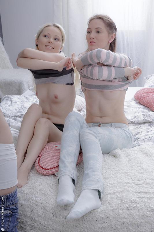 15P Two horny young chicks invite a lucky guy over to fuck