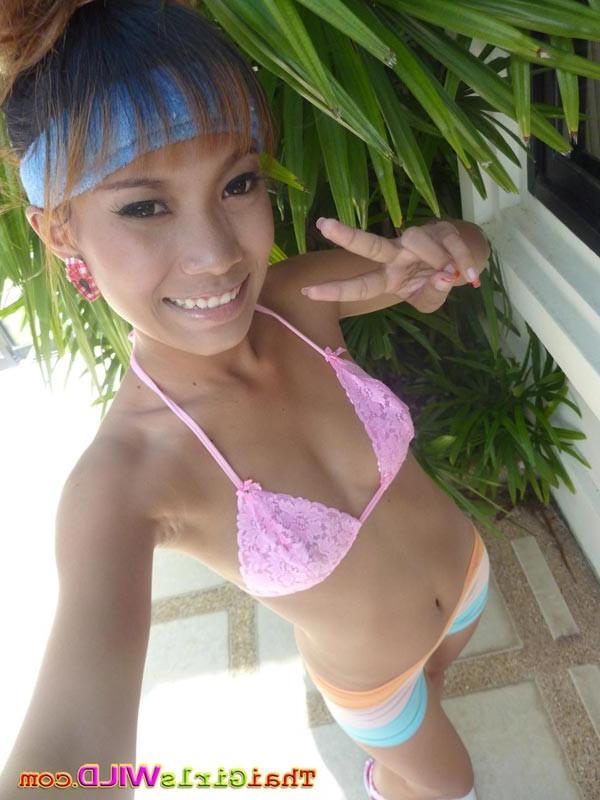 16P Thai hooker strips from her bikini to show her pussy