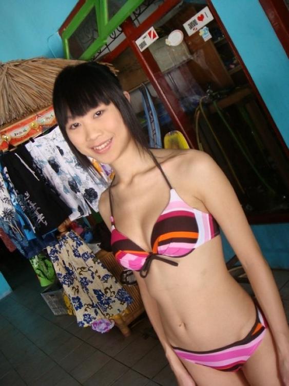 16P Asian coed goes full nude in couch shows squeezable tits