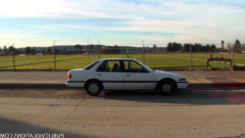 16P Asian sucks cock in a parked car and gets filmed