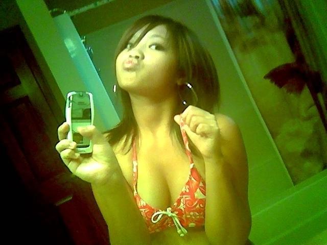16P Asian coed goes full nude in couch shows squeezable tits