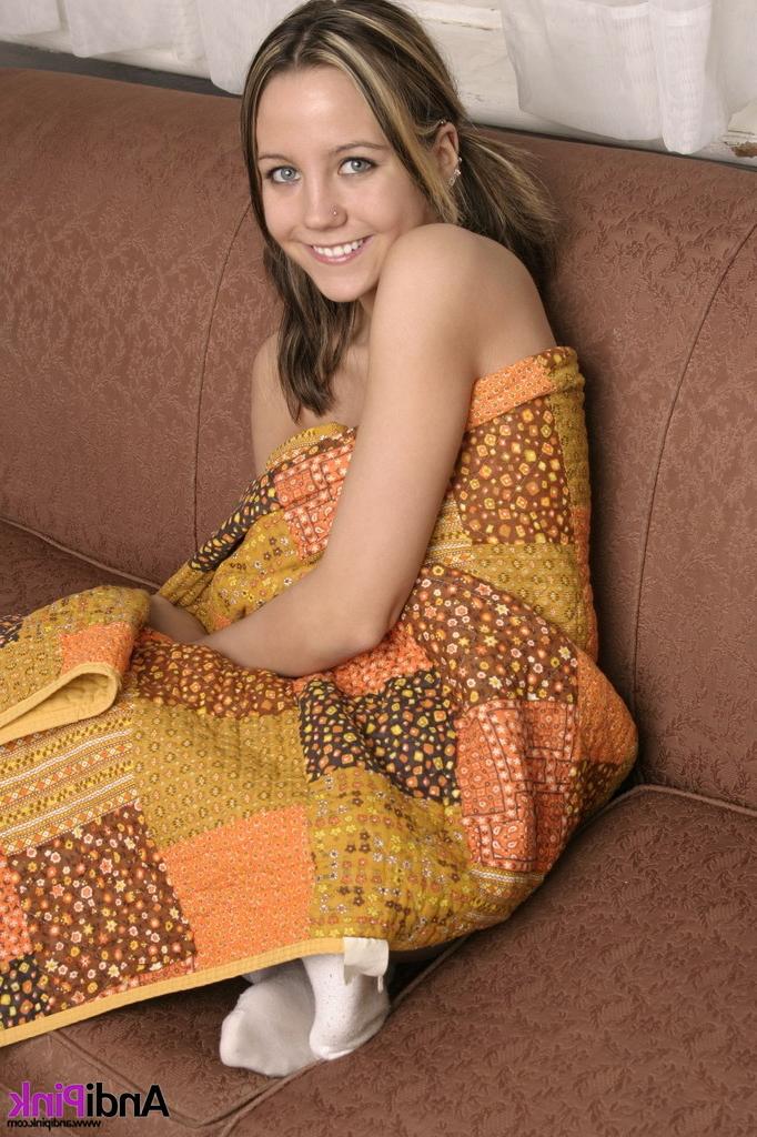 15P Andi Pink eating donuts on a couch