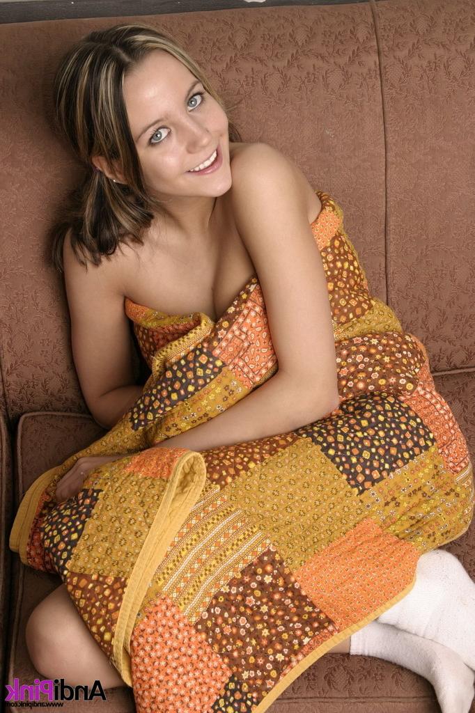 15P Andi Pink eating donuts on a couch
