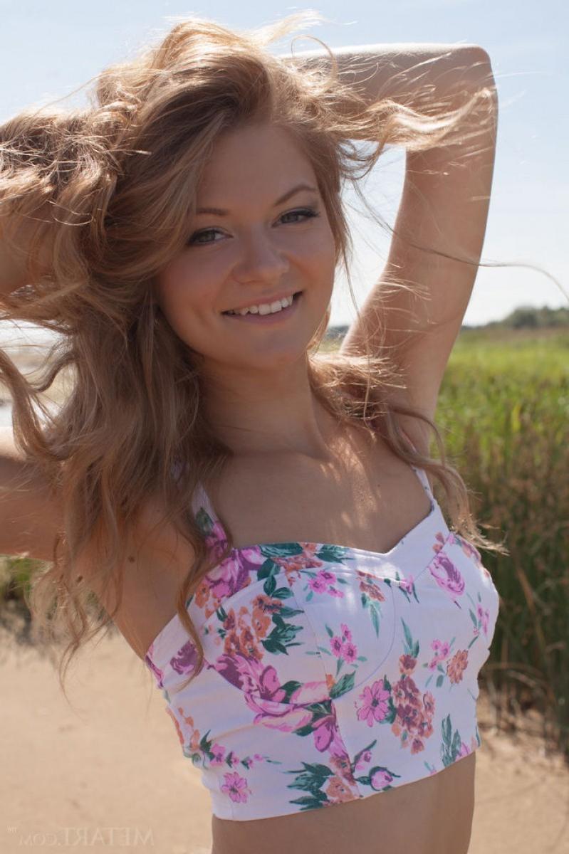 12P Cute nude blonde at the beach