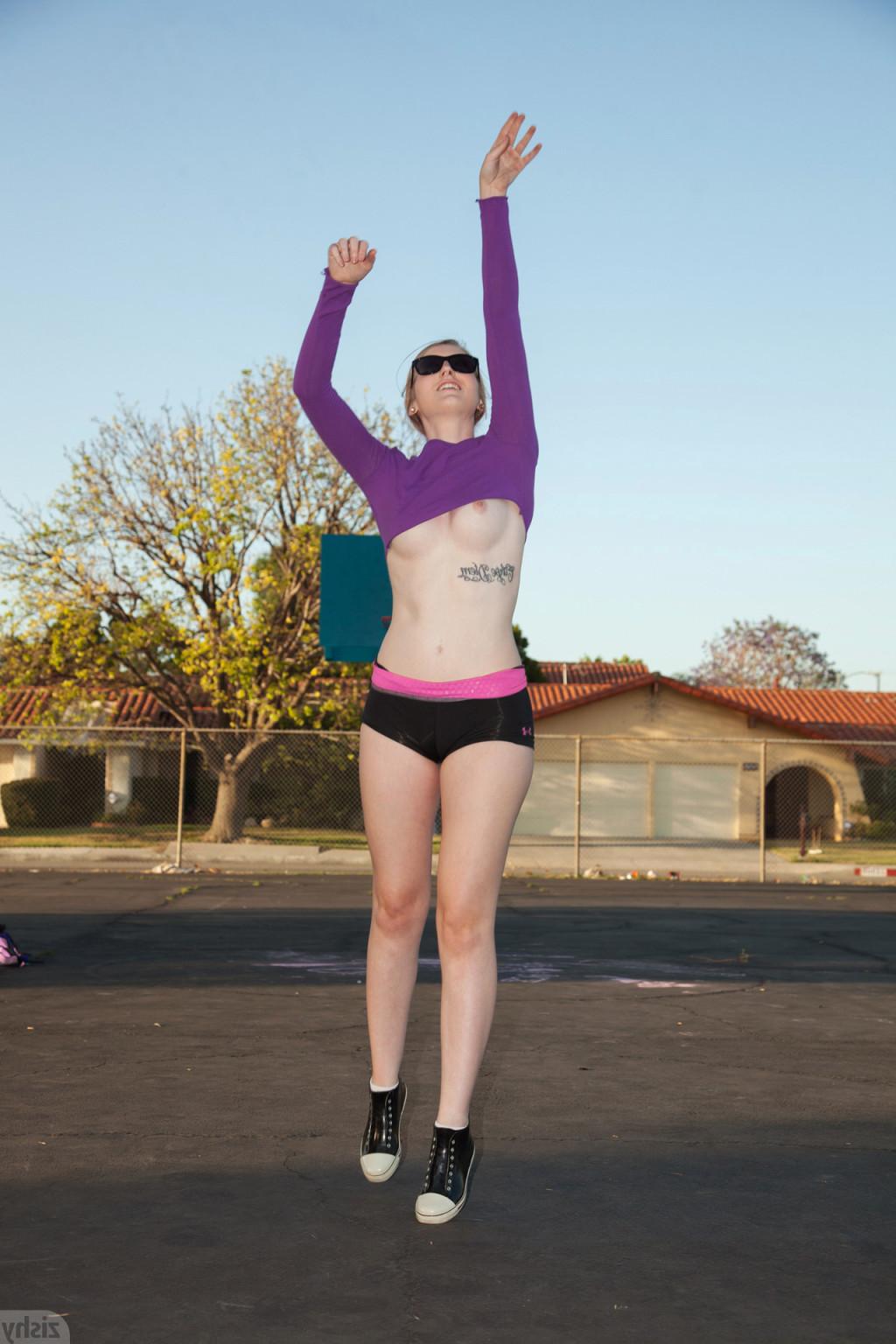 12P Sporty teen girl shooting hoops
