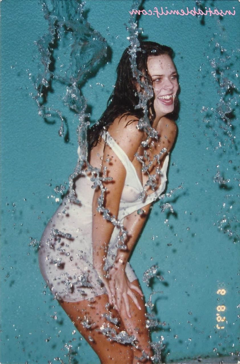 15P Sexy Diane Andrews posing in a fountain getting wet
