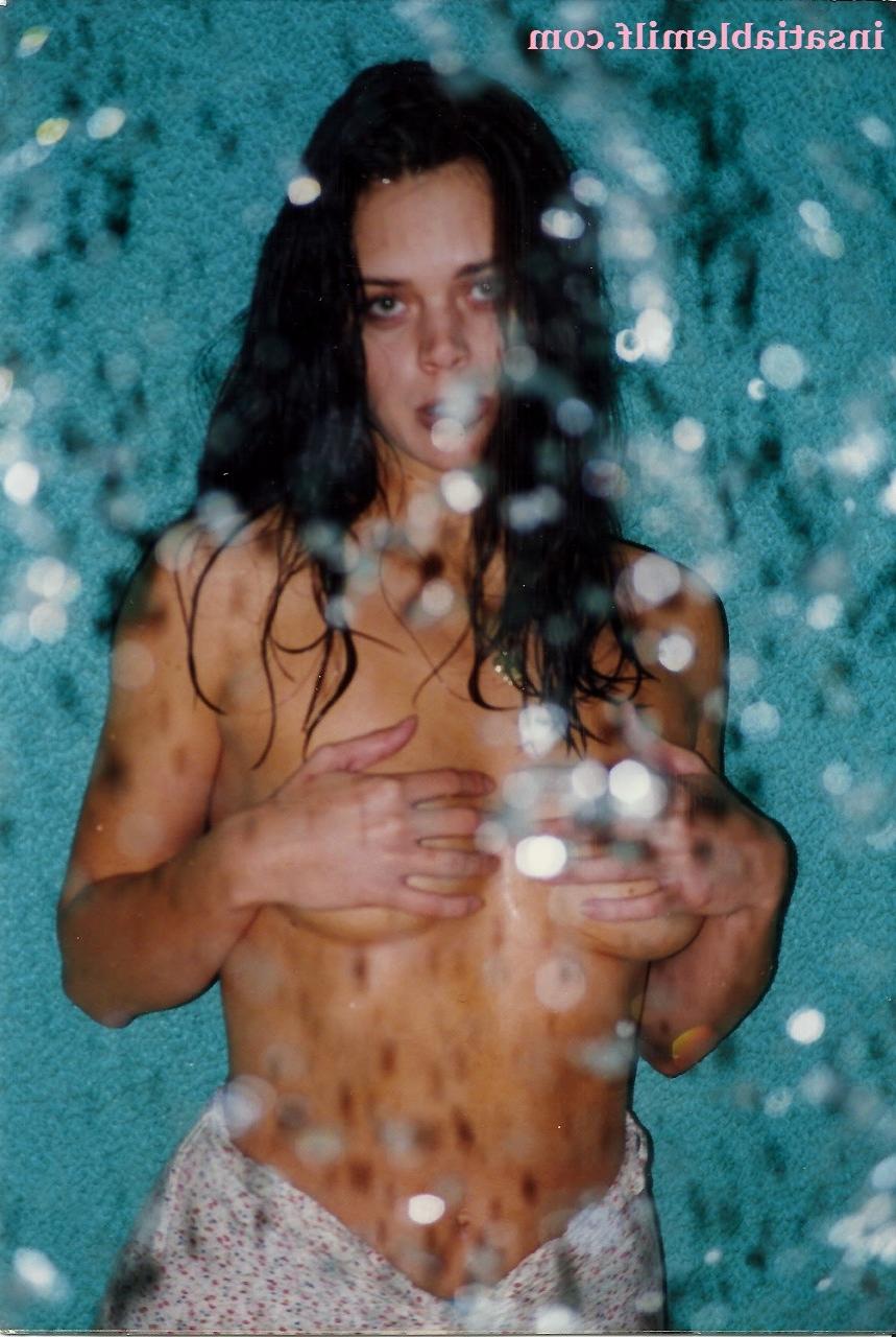 15P Sexy Diane Andrews posing in a fountain getting wet