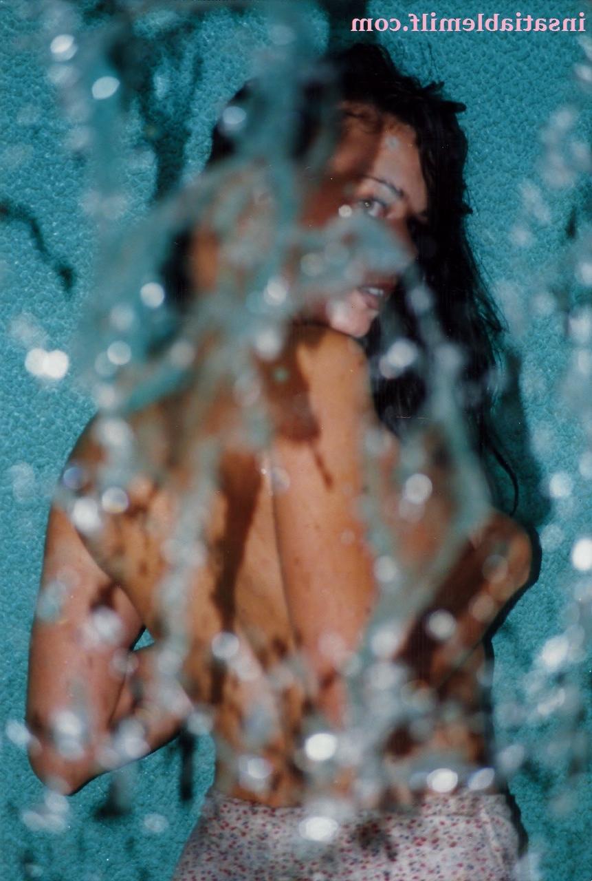 15P Sexy Diane Andrews posing in a fountain getting wet
