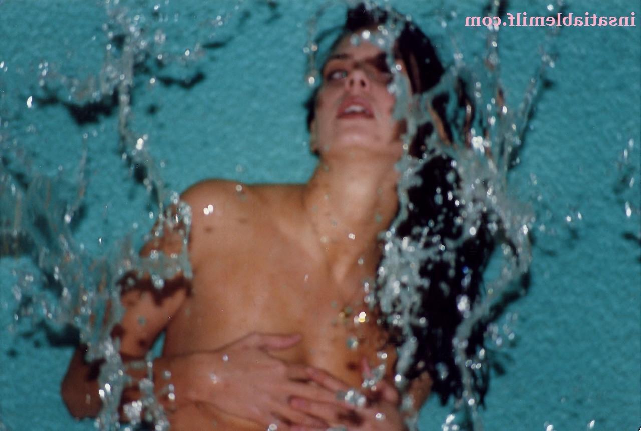 15P Sexy Diane Andrews posing in a fountain getting wet
