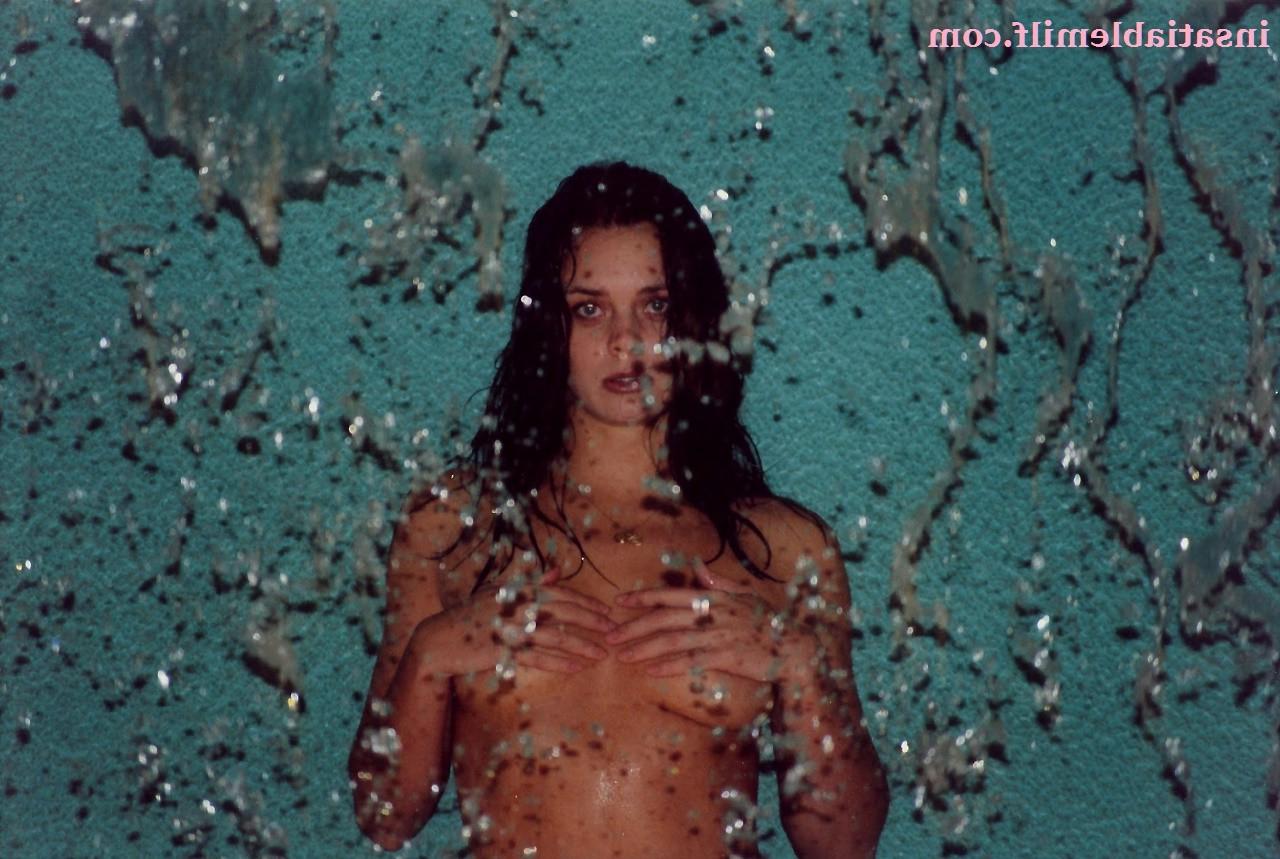 15P Sexy Diane Andrews posing in a fountain getting wet