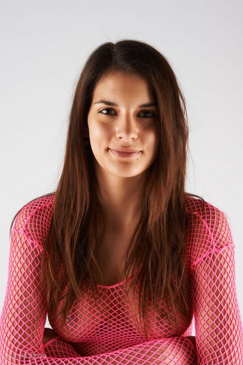 12P Slim brunette in a mesh dress