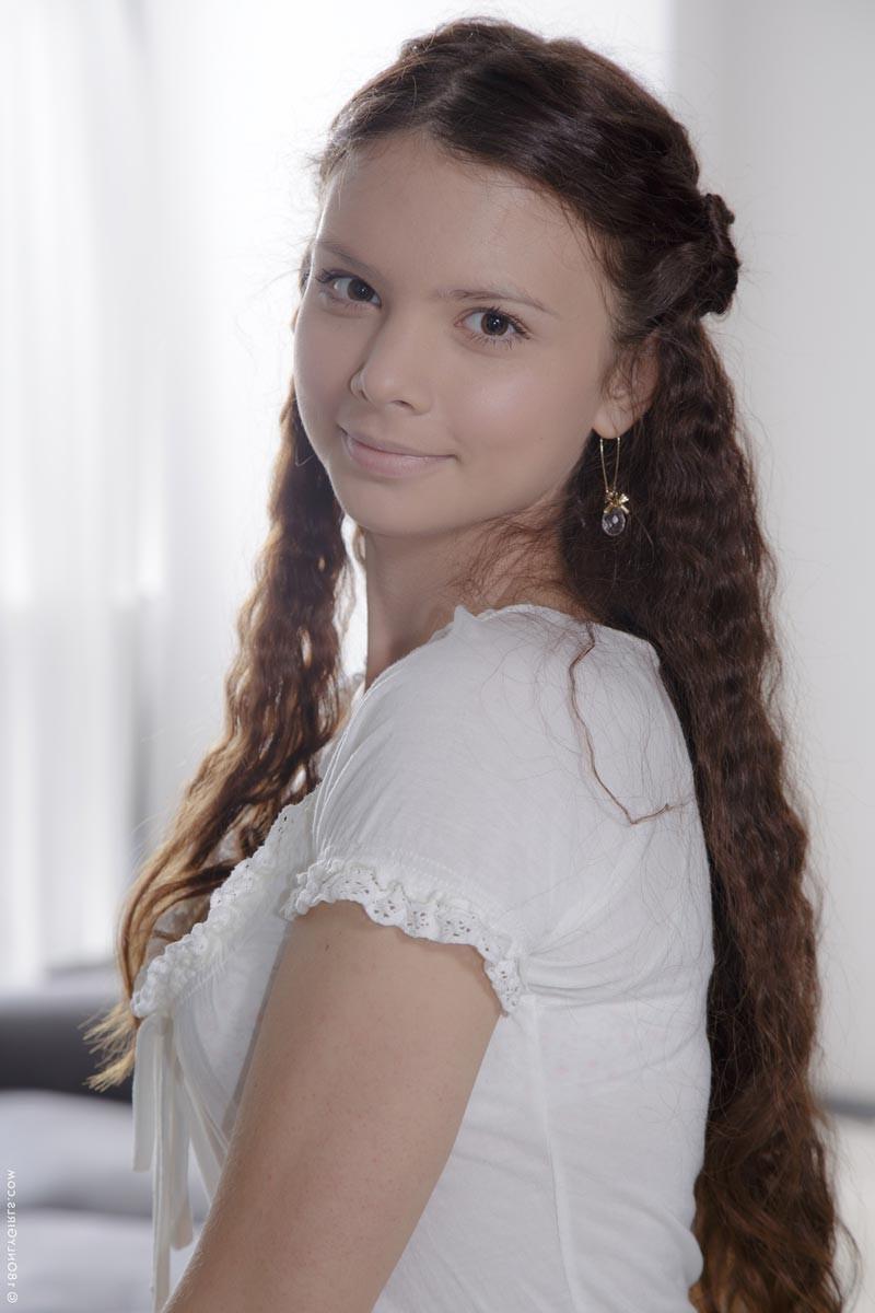 15P Sinful teen strips off her white lingerie