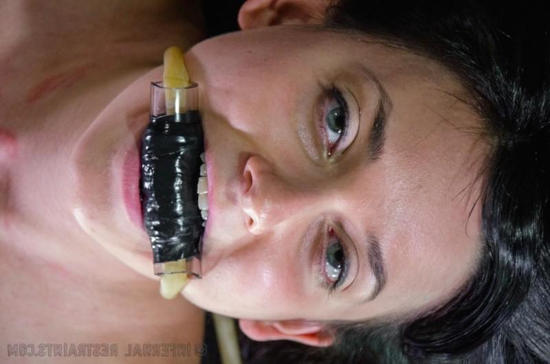 16P Amy Faye is bound in metal wearing high heels her pussy toyed to orgasm
