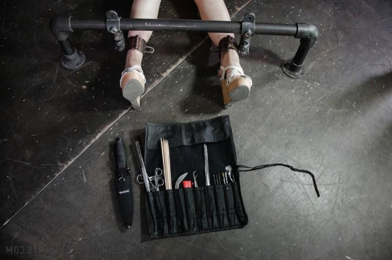 16P Amy Faye is bound in metal wearing high heels her pussy toyed to orgasm