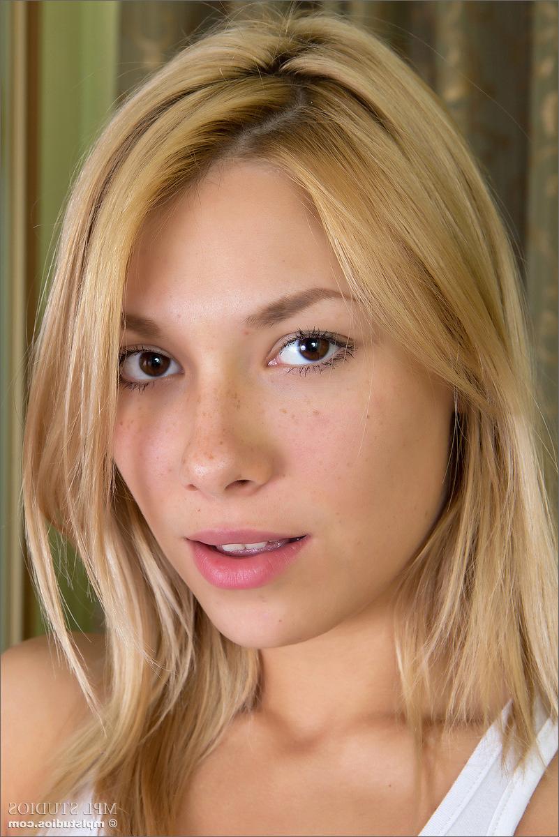 12P Stunning teen taking off clothes to get ready for bed