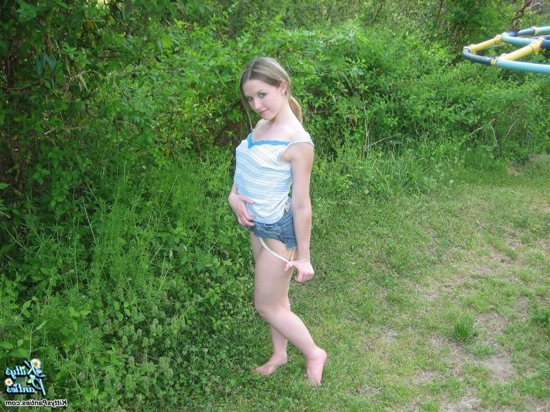 15P Upskirt panty peeks of a hot teen girl on a playground