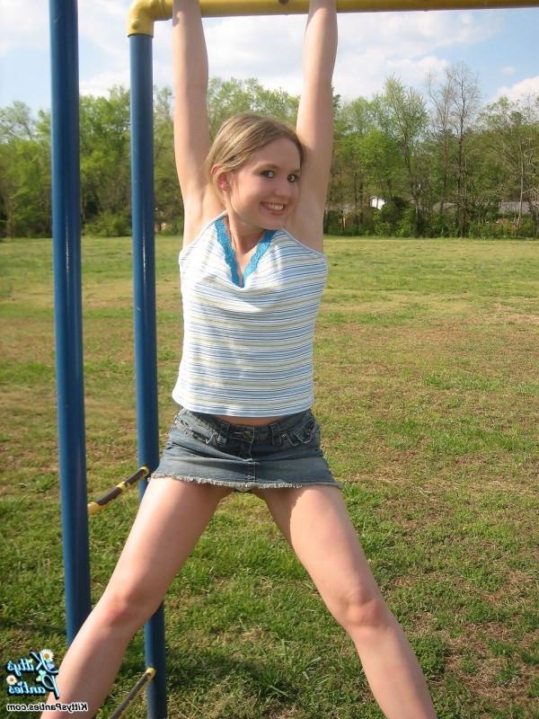 15P Upskirt panty peeks of a hot teen girl on a playground
