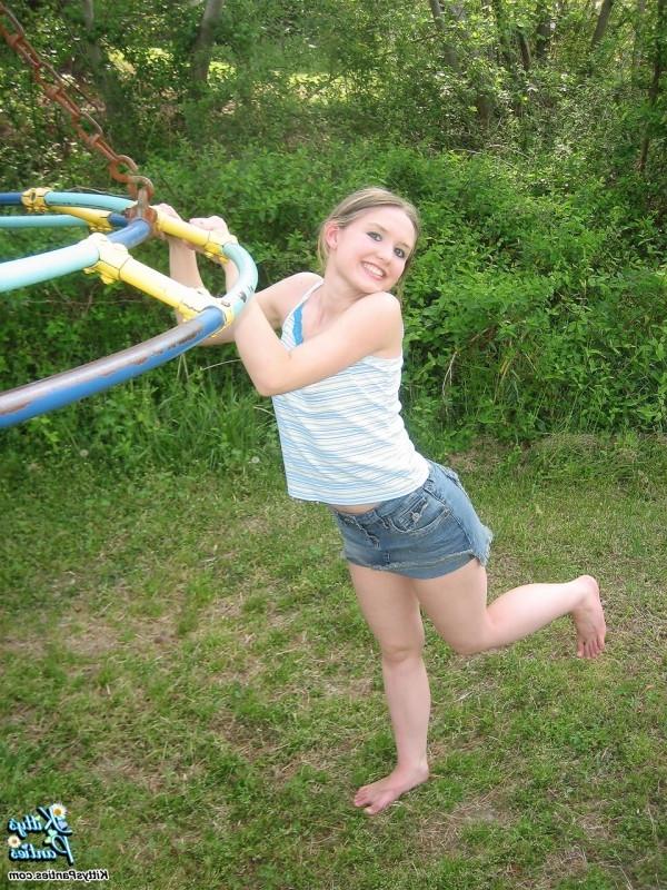 15P Upskirt panty peeks of a hot teen girl on a playground