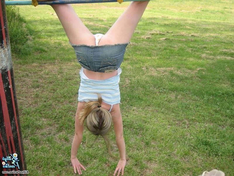 15P Upskirt panty peeks of a hot teen girl on a playground