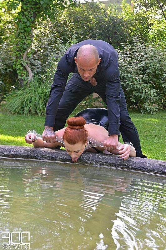 15P Isabel Dean bound submissive in black latex spanked and humiliated outdoors by m