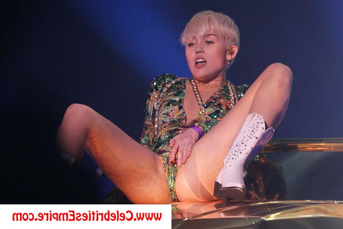 20P Miley Cyrus  spreads her legs and show nude tits