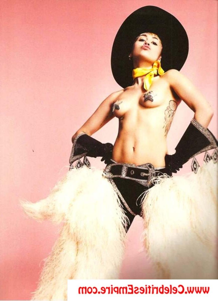 20P Miley Cyrus  spreads her legs and show nude tits