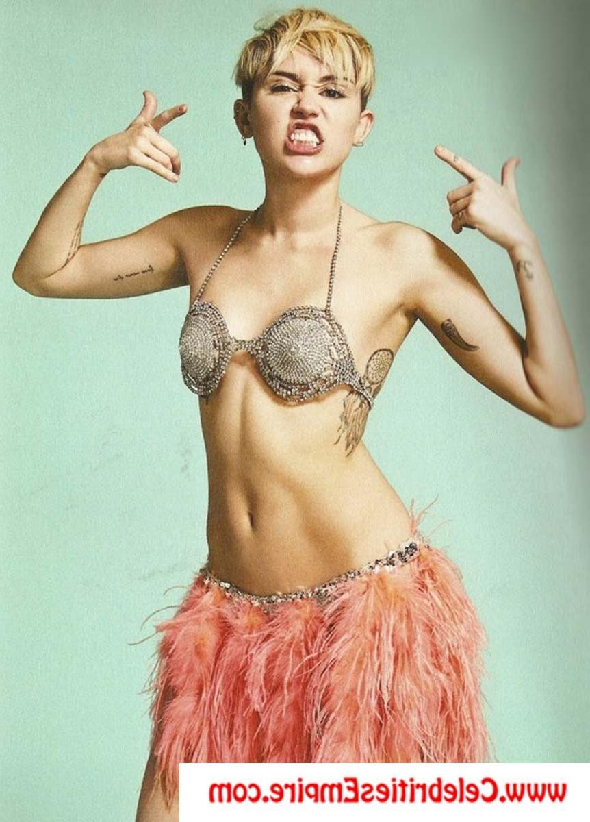 20P Miley Cyrus  spreads her legs and show nude tits