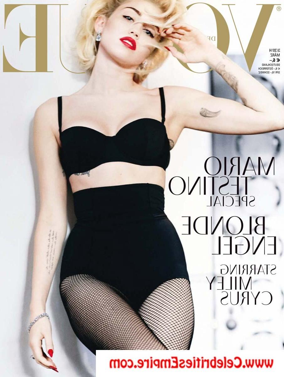 20P Miley Cyrus  spreads her legs and show nude tits