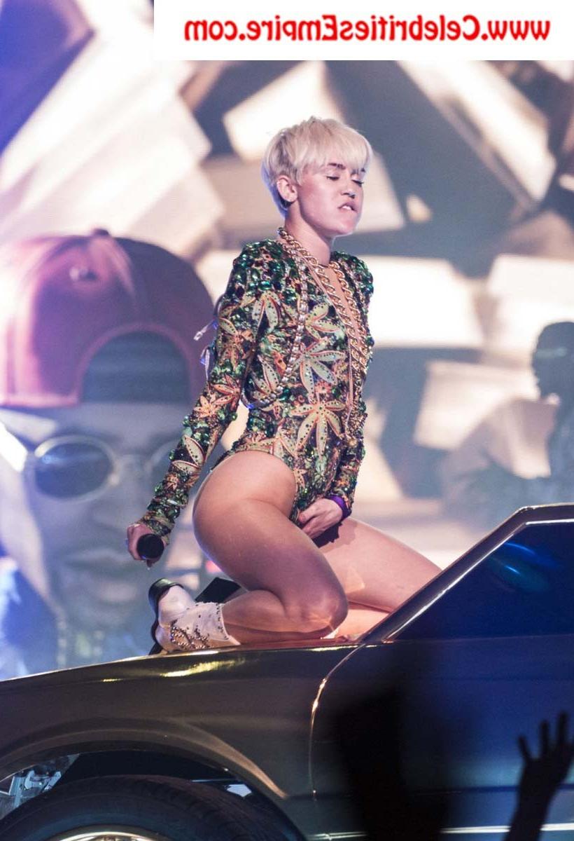 20P Miley Cyrus  spreads her legs and show nude tits