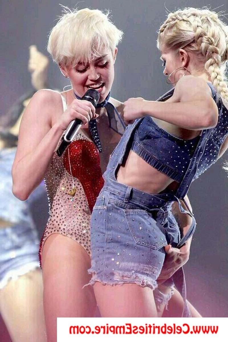 20P Miley Cyrus  spreads her legs and show nude tits