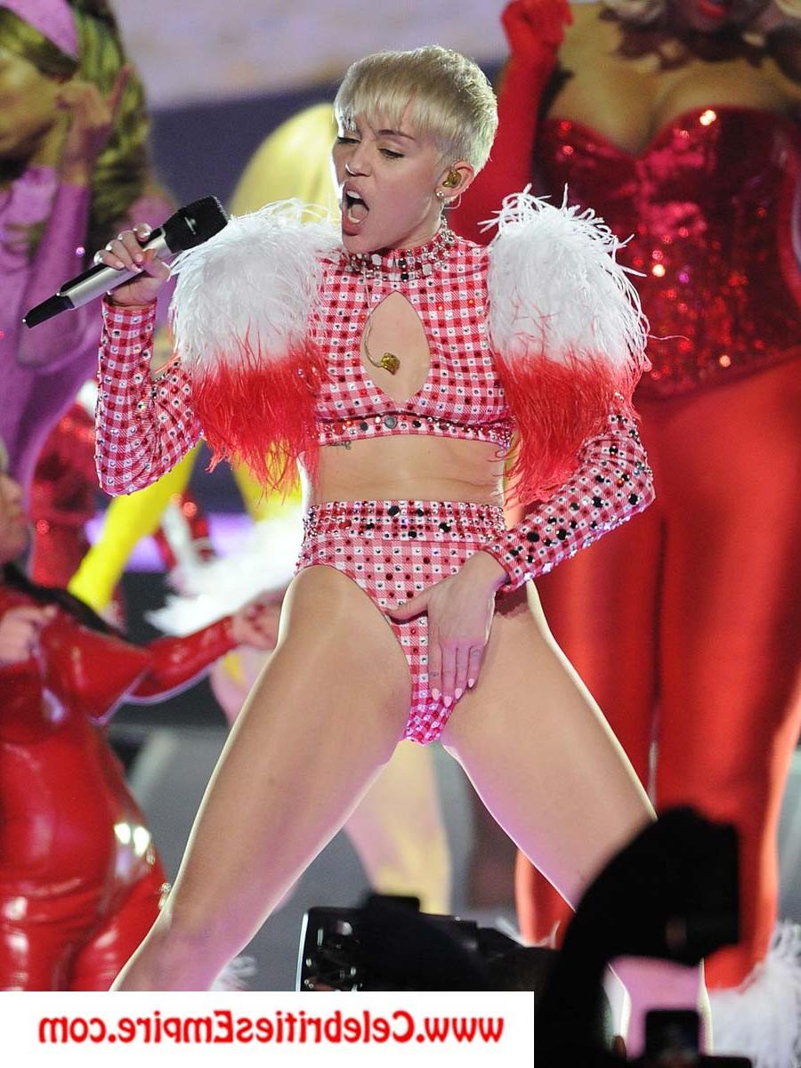 20P Miley Cyrus  spreads her legs and show nude tits