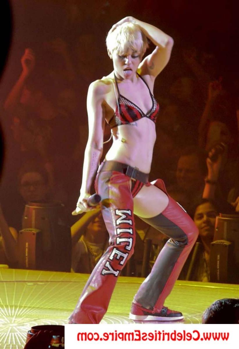 20P Miley Cyrus  spreads her legs and show nude tits