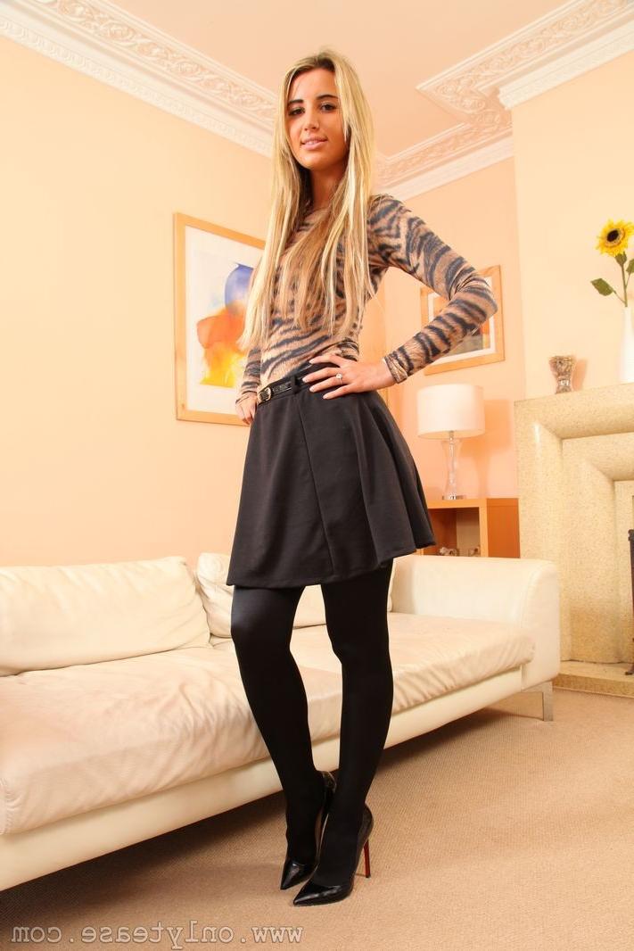 16P Stunning blonde in black shiny tights