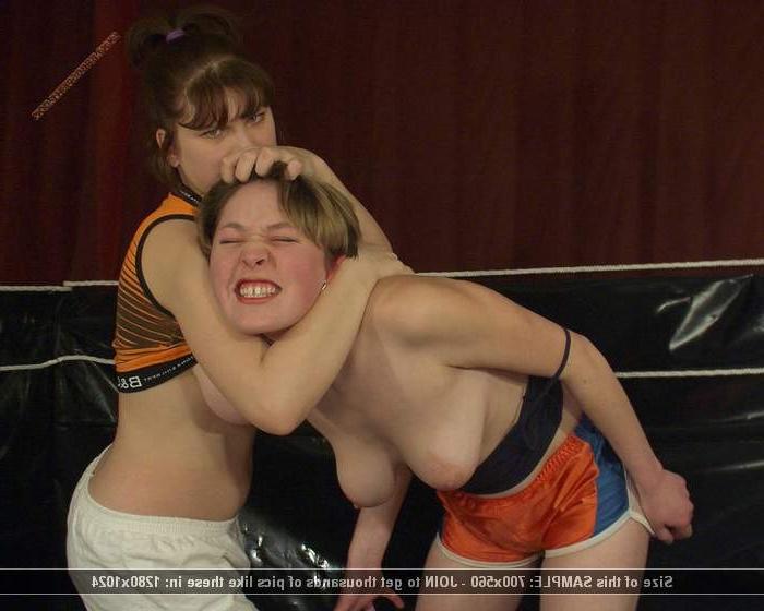12P Athletic teens hard wrestling action