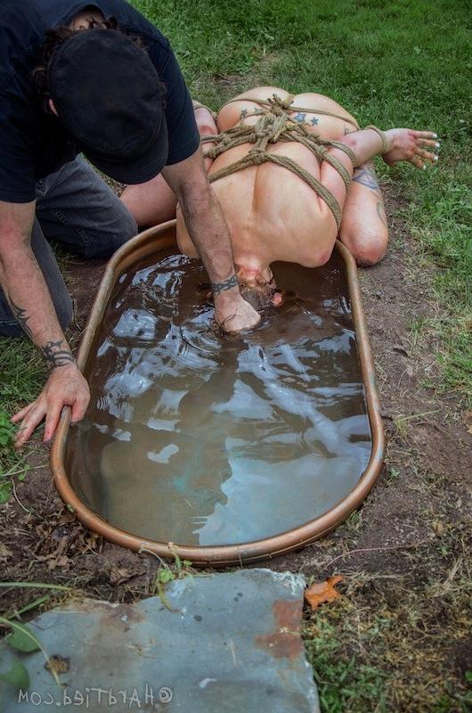 16P Rain DeGrey busty babe is tied and gagged outdoors